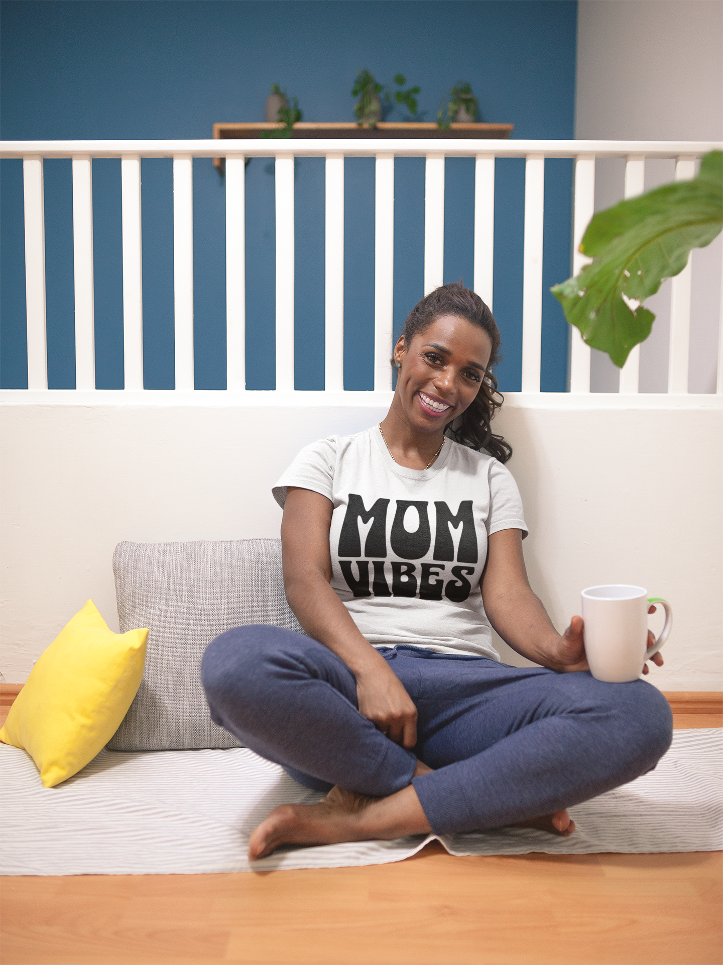 Graphic T-Shirt with Bold, Retro Text Declaring Mom Vibes.