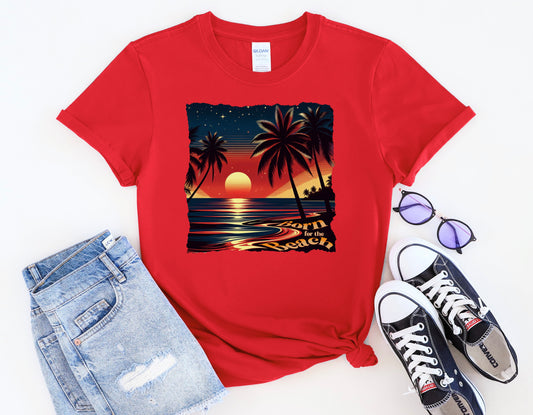 Graphic T-Shirt with the Image of a Beach Sunset and Words Born for the Beach.